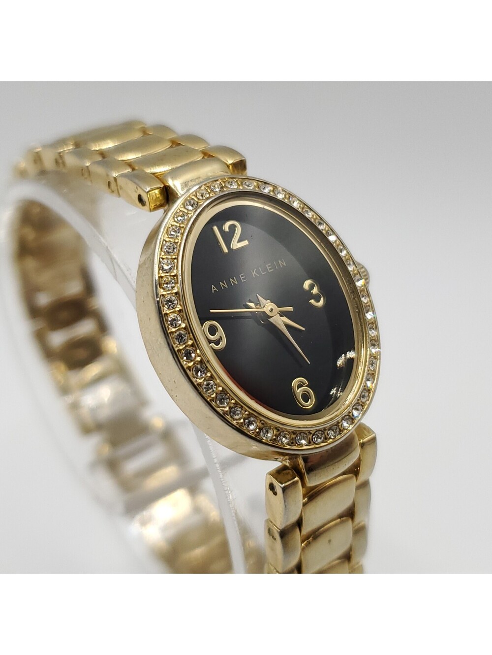 Anne Klein Oval Rhinestone Bezel Black Dial Womens Watch 19mm New Battery